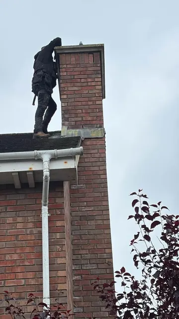 Roof window and slate repairs, photograph 1