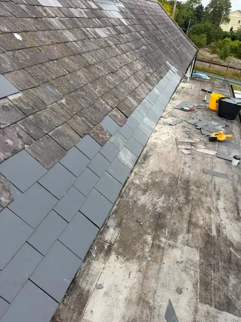 Roof window and slate repairs, photograph 4