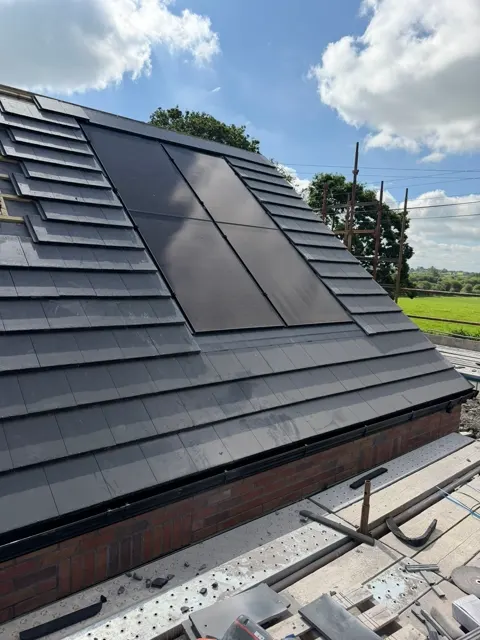 New build roofing in progress, photograph 7