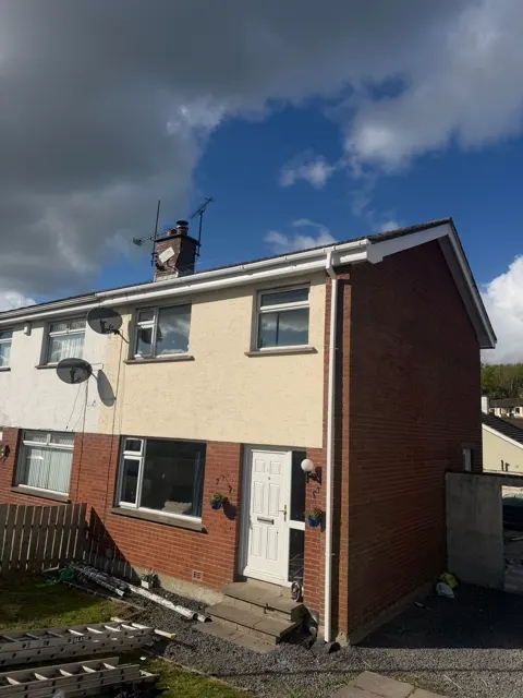 White PVC roofline installation, photograph 2