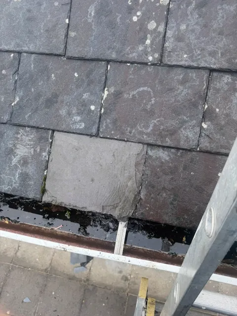 Slate repairs and gutter maintenance, photograph 9