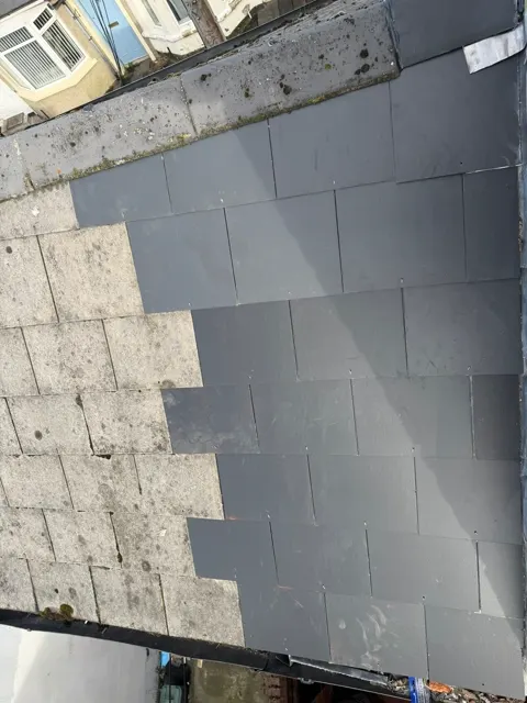 Roof leak and ceiling repair, photograph 2