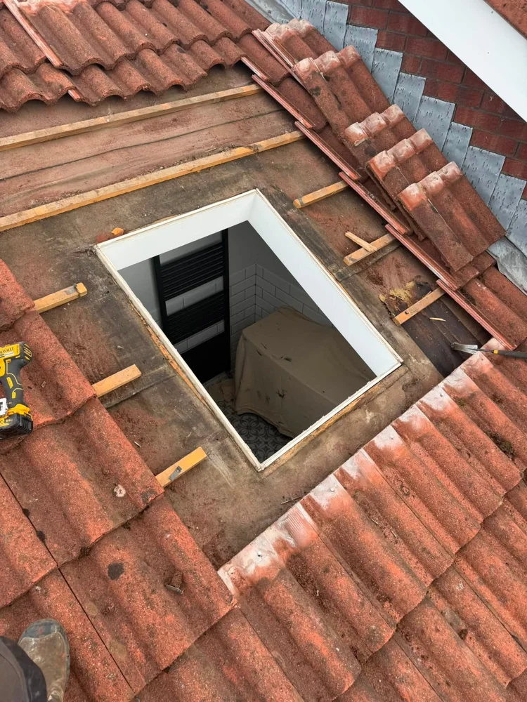 Roof window and slate repairs